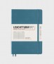Medium A5 notebook. Blue hardcover. Finishing lines