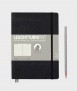 Medium A5 notebook. Black soft top. Finishing lines
