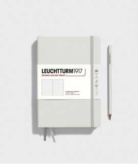 Medium A5 notebook. Gray hardcover. Stitch finish