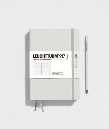 Medium A5 notebook. Gray hardcover. Stitch finish