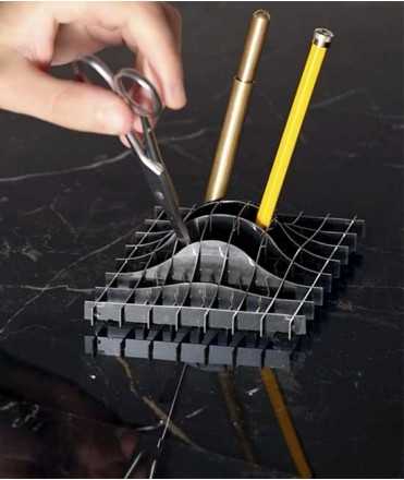 Gravity Pencil Holder
