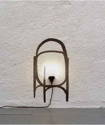 Low-cost, portable wall lamp