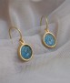 Pendientes gancho dorados Gaudí Jewelry azul