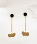Pendientes dorados corazón negro Miró