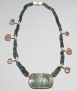 Collar oro, fuchsita, turmalinas, amonites y cuarzo